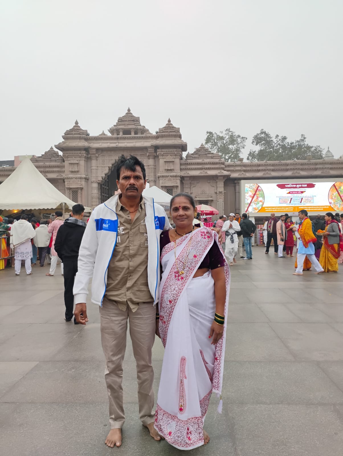 Guest standing in front of Kashi Vishwanath Temple entrance